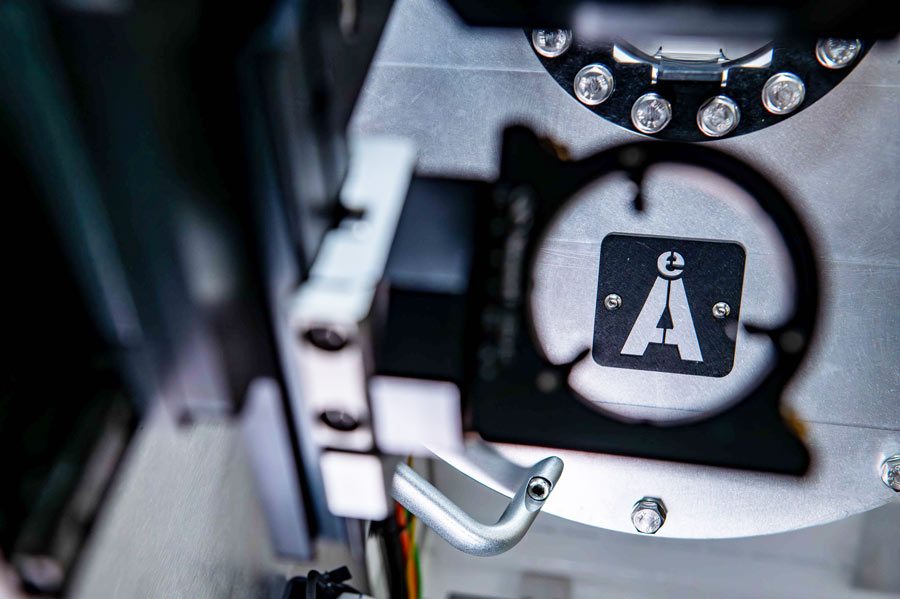 alt = Close-up view of Angstrom Engineerings' PLD system's interior with Angstrom Engineering logo
