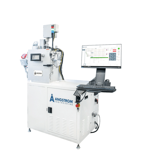 alt = The NEXDEP PVD system designed and created by Angstrom Engineering, featuring a compact central rectangular chamber. The system includes various tubes for precise material processing. To the right, a digital monitor and control panel display detailed operational data on Angstrom Engineering’s AERES software. The Angstrom Engineering logo is displayed on the front.